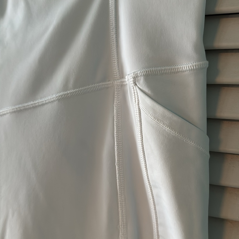 Lululemon like new leggings. White size 12 pockets on both sides - Picture 2 of 6